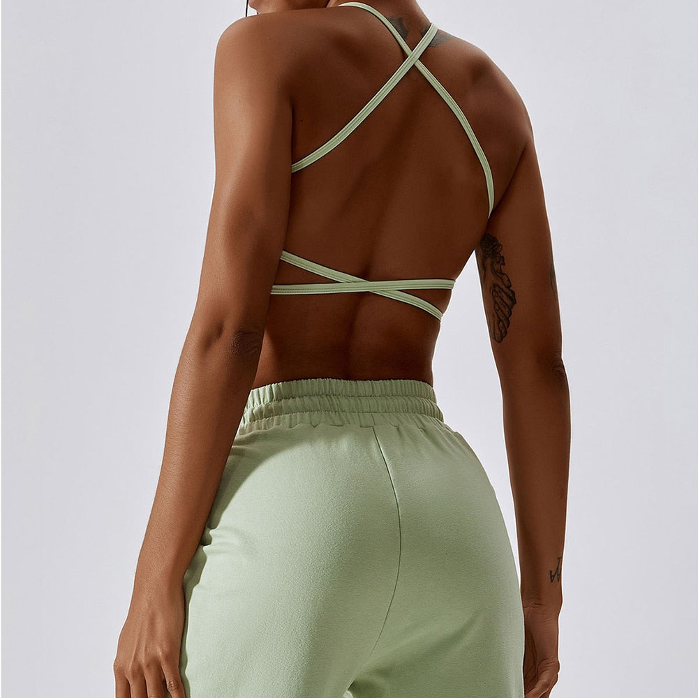 Cali Sports Bra: A game-changer in activewear support and style. Crafted from a blend of nylon and spandex for comfort and performance. Built to last through tough workouts with a cross over back design. Snug and supportive fit with removable pads. Moisture-wicking fabric keeps you dry and comfortable, ensuring confidence throughout your workout. Order your Cali Sports Bra today and embrace the ultimate in comfort and performance for a confident fitness journey!