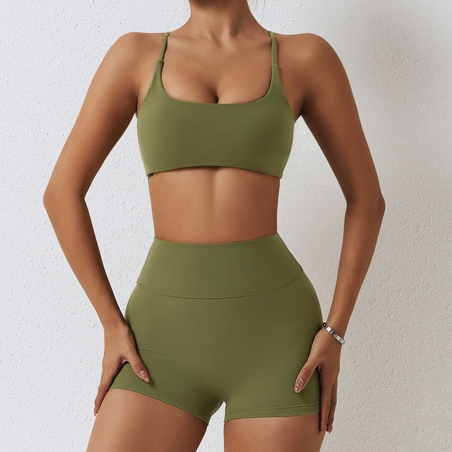 Cali Set - Elevate your workout with high-waisted shorts and cross back sports bra. Quick-dry, breathable, and stylish for a comfortable and fashionable gym session.