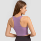 Venice Crop - Women's gym singlet made from a breathable and sweat-wicking nylon/spandex blend, featuring a built-in sports bra for maximum support and comfort. Stylish, cropped, and fitted design for both streetwear and gym wear, ensuring you look and feel your best during intense workouts.