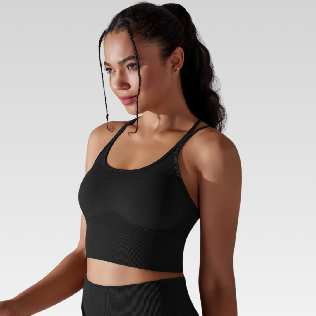 Georgia Cross Back Sports Bra: Medium support for versatile workouts. Crafted from a nylon/spandex blend for flexibility and style. Breathable design for cool workouts and quick-dry technology for on-the-go convenience. Elevate your workout confidence with the Georgia Sports Bra.