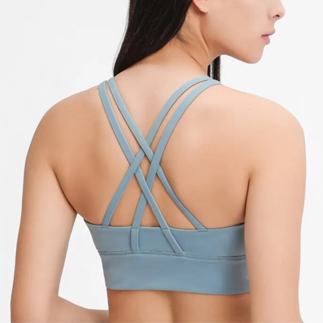 Rayna Sports Bra: Innovation, Style, and Performance Combined. Double Brushed Fabric with Mesh Panel for Maximum Breathability. Crafted from Breathable Nylon/Spandex Blend for Unbeatable Comfort and Flexibility. Stay Stylish, Stay Supported.