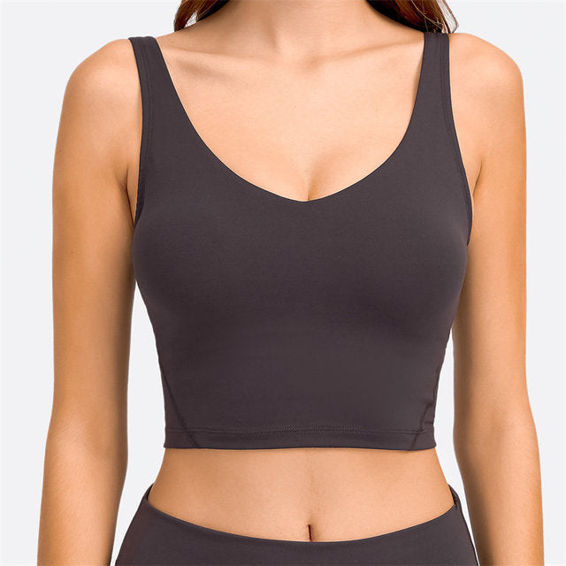 Louise Singlet: The Ultimate Women's Gym Essential - Nylon/Spandex Blend for Comfort, Durability, and Style. Built-in Sports Bra for Maximum Support, Breathable and Sweat-Wicking Material for Comfortable Workouts. Upgrade Your Workout Wardrobe with the Perfect Blend of Comfort, Durability, and Style.