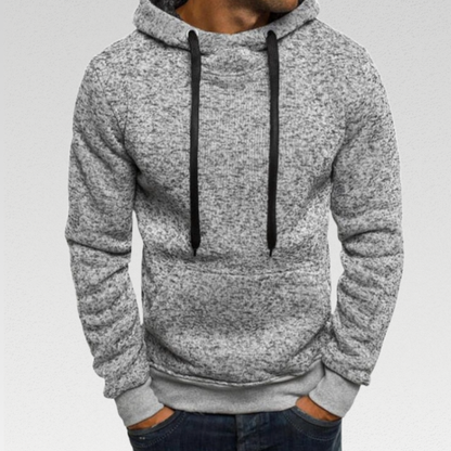 Caleb Hoodie - Marled grey polyester hoodie for winter warmth. Durable, temperature-regulating, and lightweight. Large drawstring hood and front pocket for added convenience.