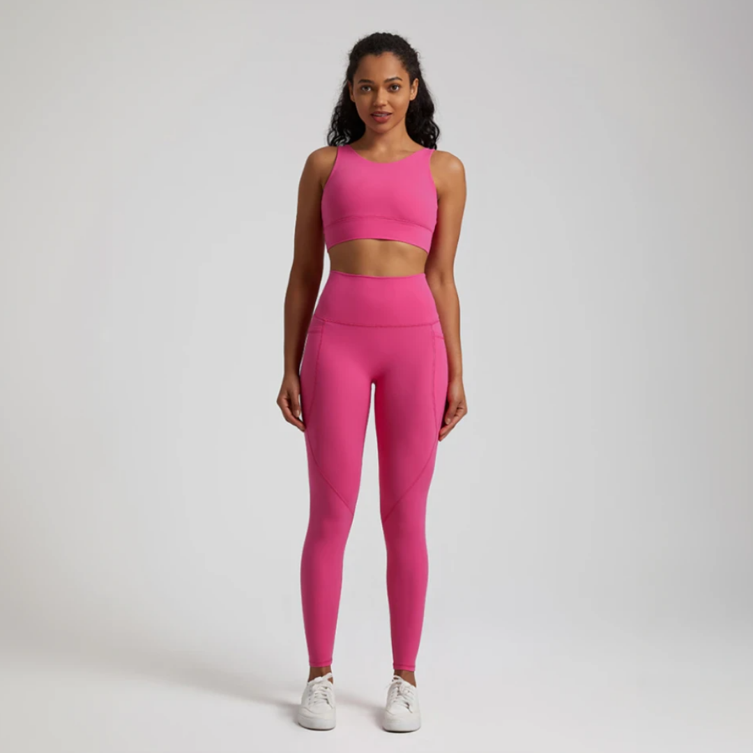 Women's two-piece gym set in breathable nylon/spandex blend. High-waisted leggings with seamless design for a flattering fit. Unique back design on sports bra adds style. Quick-drying material for comfort during workouts. Medium support and compression for unrestricted movement. Venus set - a must-have for any active woman's wardrobe.