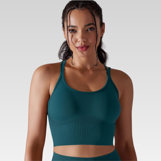 Georgia Cross Back Sports Bra: Medium support for versatile workouts. Crafted from a nylon/spandex blend for flexibility and style. Breathable design for cool workouts and quick-dry technology for on-the-go convenience. Elevate your workout confidence with the Georgia Sports Bra.