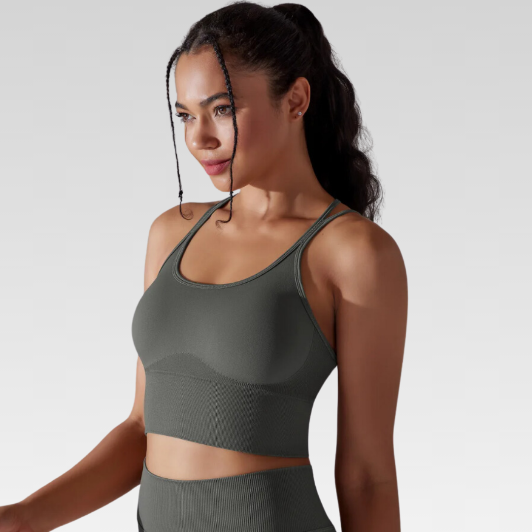 Georgia Cross Back Sports Bra: Medium support for versatile workouts. Crafted from a nylon/spandex blend for flexibility and style. Breathable design for cool workouts and quick-dry technology for on-the-go convenience. Elevate your workout confidence with the Georgia Sports Bra.