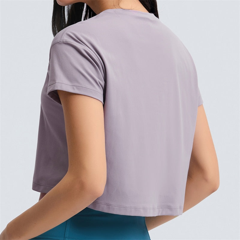 Juniper Cropped Tee: The Ultimate Women's Workout Shirt for Style, Durability, and Comfort - Crafted from Nylon and Spandex with Moisture-Wicking Technology, Breathability, and Unrestricted Movement. Upgrade Your Fitness Wardrobe and Train in Style!