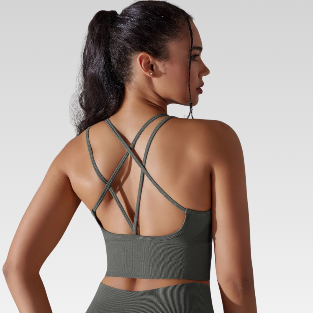 Georgia Cross Back Sports Bra: Medium support for versatile workouts. Crafted from a nylon/spandex blend for flexibility and style. Breathable design for cool workouts and quick-dry technology for on-the-go convenience. Elevate your workout confidence with the Georgia Sports Bra.