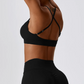 Marianna Cross Back Sports Bra: Elevate Your Workout Experience with Fashion-Forward Design and High-Performance Functionality - Stylish Cross Back, Adjustable Straps, and Durable Nylon/Spandex Blend Built to Last. Experience Unparalleled Comfort and Support with Optimal Breathability. Redefine Your Athletic Wardrobe with Marianna.