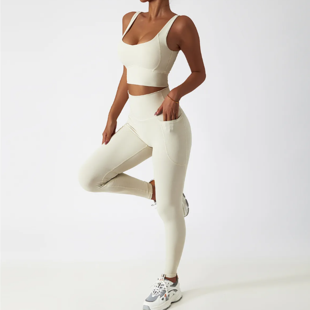 Helena Set - Elevate your workout experience with this stylish and functional activewear set. The breathable comfort, quick-dry technology, compression waistband, and high-waisted leggings with pockets redefine activewear elegance. Stay cool, confident, and convenient during your active pursuits. 