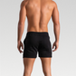 Cambridge Men's Shorts: Premium breathable cotton for cool comfort at home or on the go. Mid-length gym shorts with sweat-wicking material to keep you fresh during workouts or errands. Durable fabric ensures longevity. 3 pockets, drawstring waistband, and sweat-proof design make these shorts perfect for workouts or lounging.