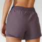 Dakota Running Shorts: Experience a new level of comfort and functionality. Tailored for performance and style, crafted from a premium nylon/lycra blend for flexibility and durability. Elastic drawstring waistband for a comfortable and secure fit during all-day runs. Interior fitted shorts with a pocket for convenient storage of essentials. Elevate your running experience with the perfect blend of comfort and functionality.