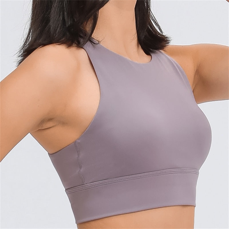 Upgrade Your Workout Wardrobe with the Monaco Sports Bra: Uniquely Designed for Comfort and Style. Made from Buttery Soft Material, Featuring Sweat-Wicking Abilities, and Medium Support Level. Customize Your Fit with Removable Pads. Elevate Your Active Lifestyle with Fashion and Function.