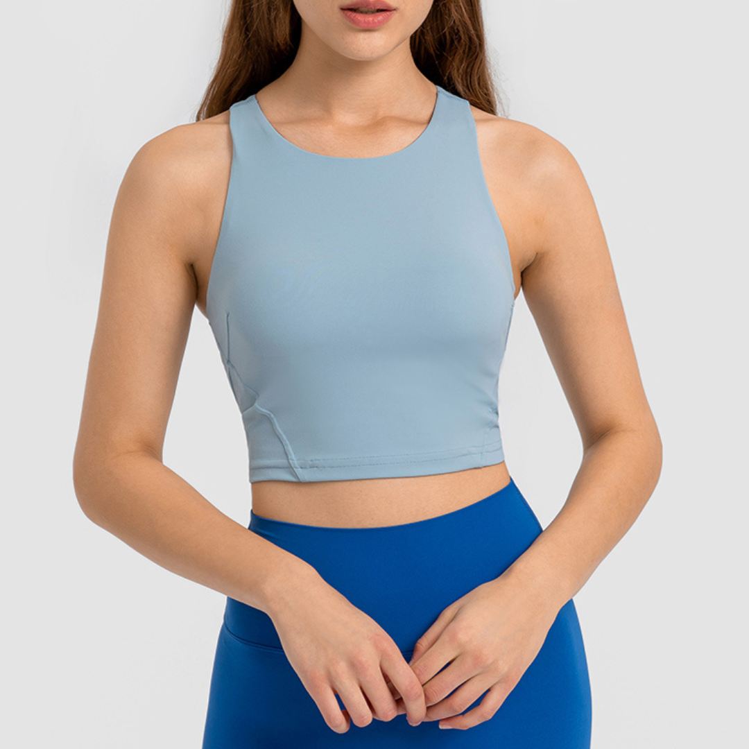 Venice Crop - Women's gym singlet made from a breathable and sweat-wicking nylon/spandex blend, featuring a built-in sports bra for maximum support and comfort. Stylish, cropped, and fitted design for both streetwear and gym wear, ensuring you look and feel your best during intense workouts.