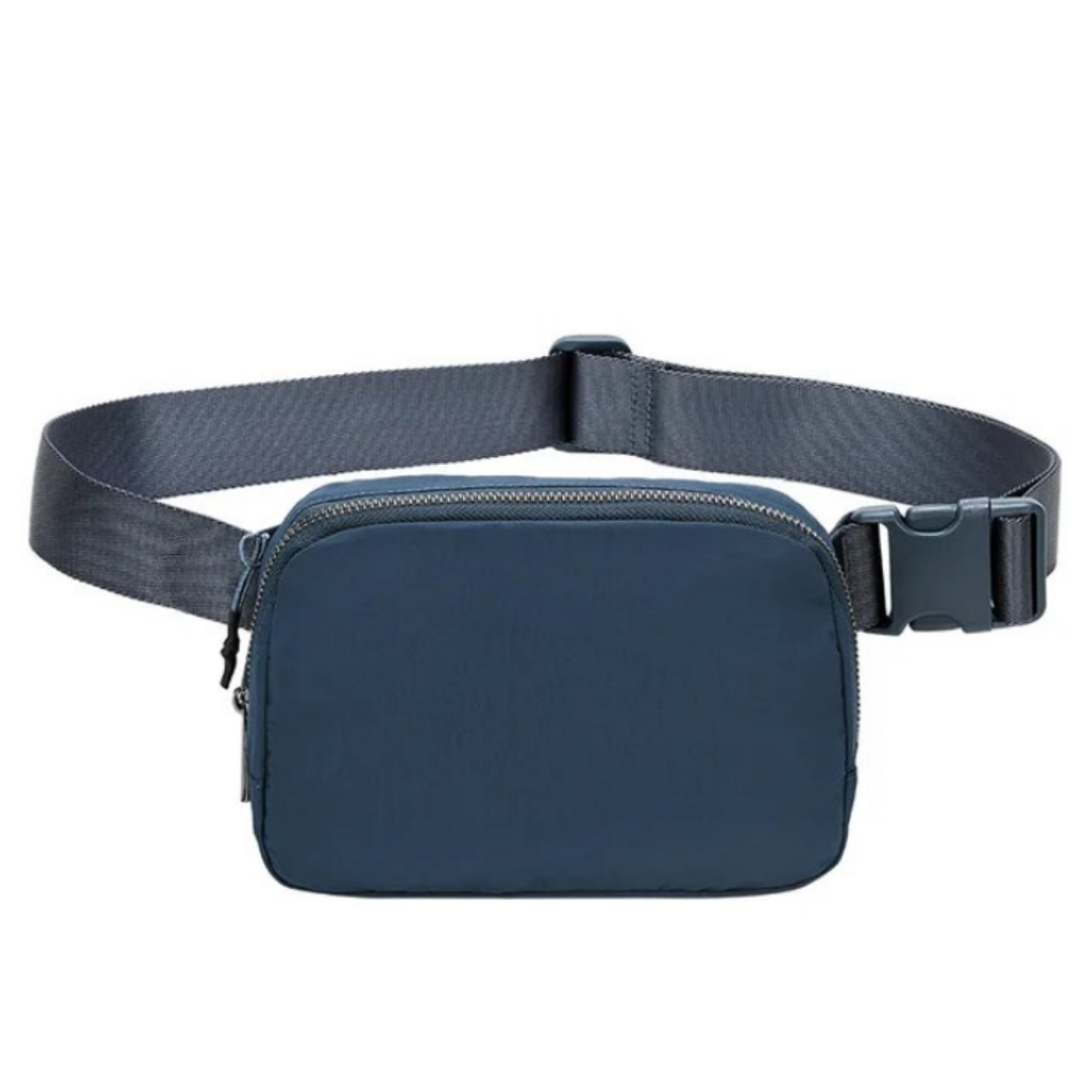 Adjustable Mini Waist Bag: Redefining On-the-Go Fashion with Compact Design, Adjustable Strap, and Secure Zip Closure. Experience Hands-Free Convenience Whether Worn Around the Waist or Crossbody. Petite Size (14cm x 20cm), Big Impact - Elevate Your Daily Adventures in Style. Explore Now!