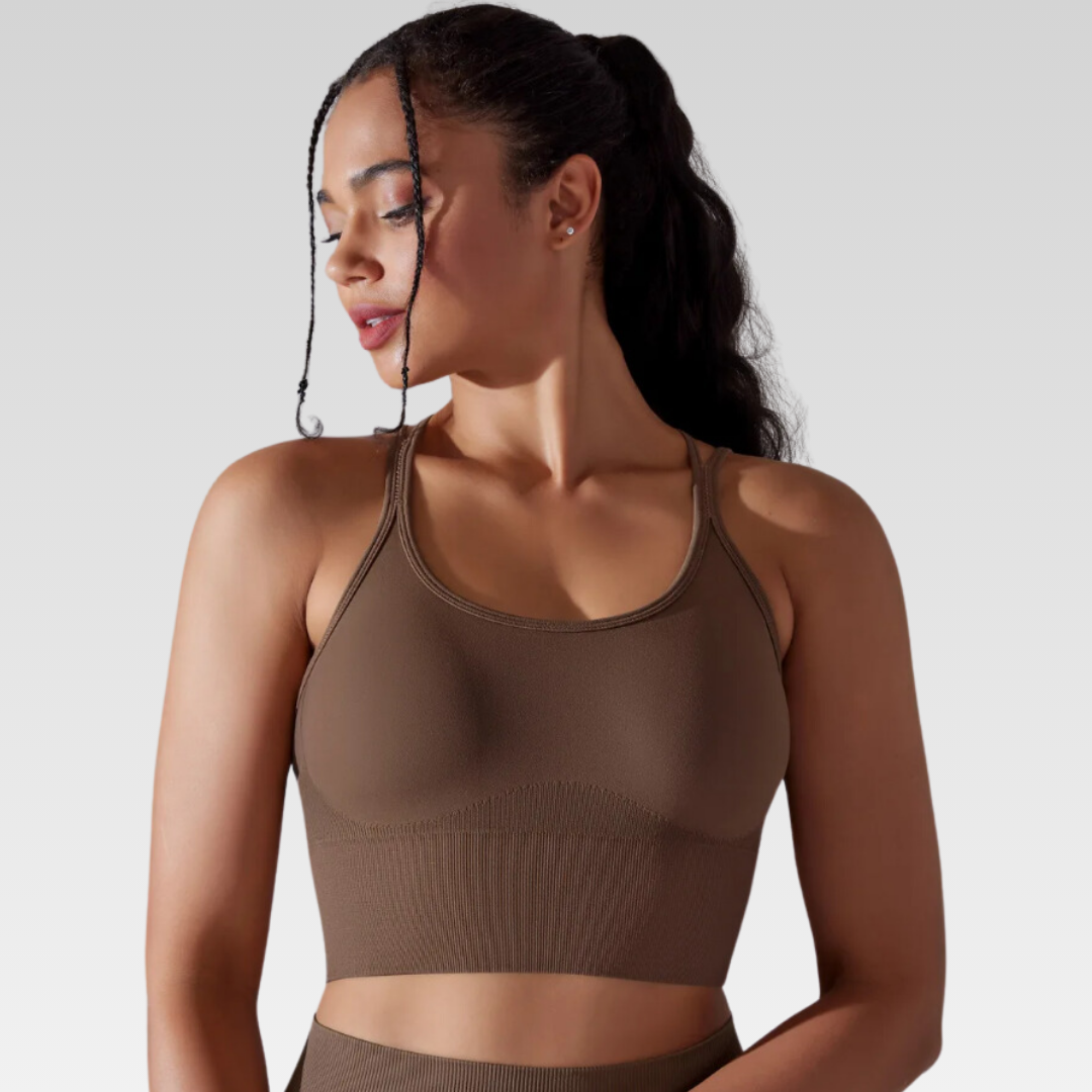 Georgia Cross Back Sports Bra: Medium support for versatile workouts. Crafted from a nylon/spandex blend for flexibility and style. Breathable design for cool workouts and quick-dry technology for on-the-go convenience. Elevate your workout confidence with the Georgia Sports Bra.