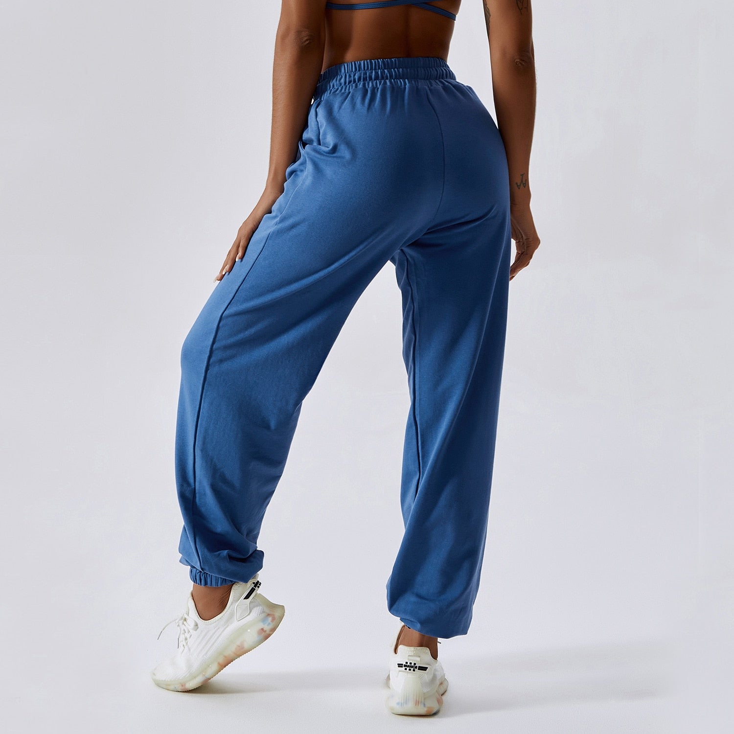 Cali Loose Fit Sweats: Crafted from a durable cotton/spandex blend for the perfect balance of comfort, style, and functionality. Built to last with a premium blend designed to withstand any activity. Stay comfortable with moisture-wicking fabric, cuffed ankles, elastic drawstring waist, and convenient side pockets. Elevate your casual wear with these versatile and lovable sweats!