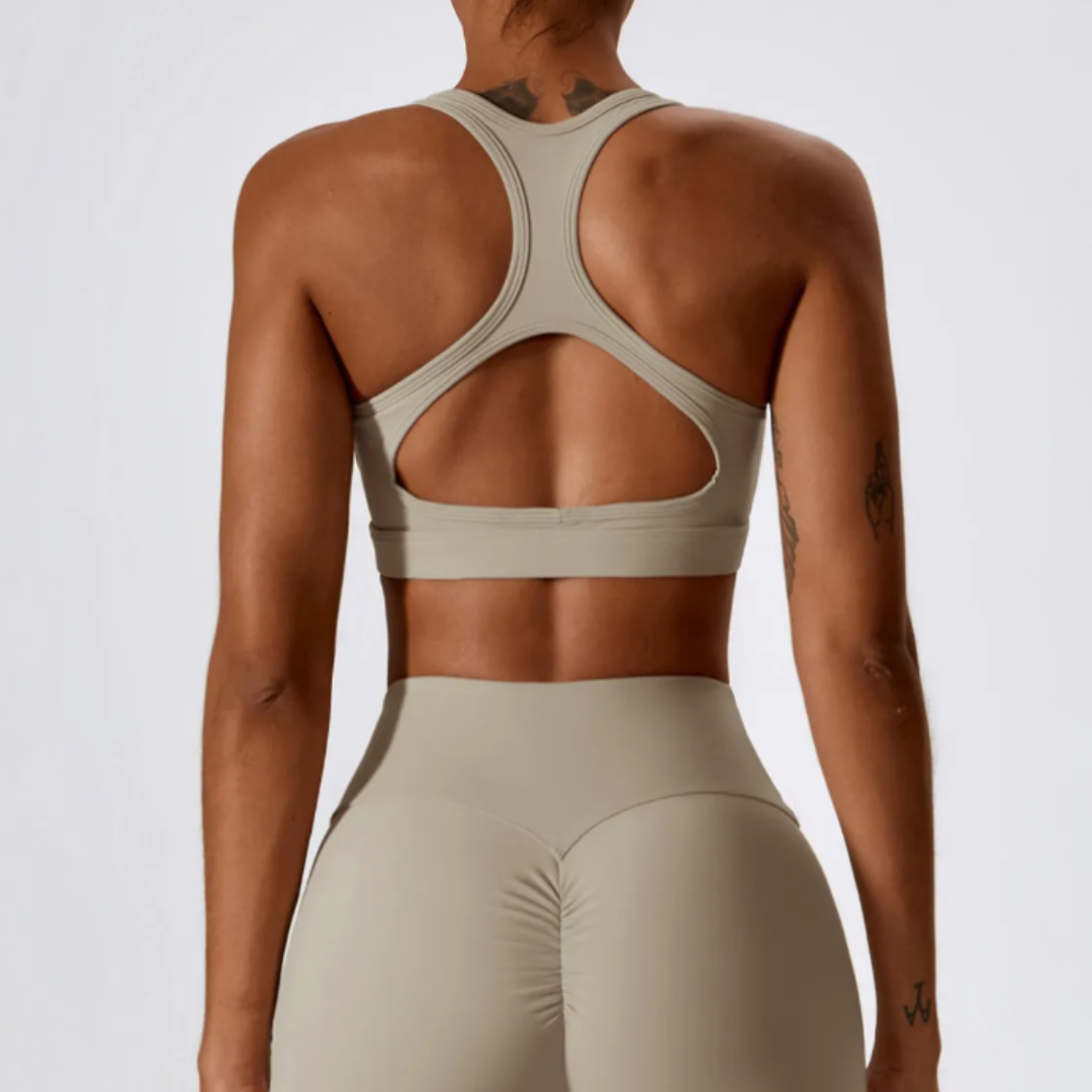 Marianna Keyhole Sports Bra: Elevate Your Workout with Fashion-Forward Design and High-Performance Functionality - Built to Last with Durable Nylon/Spandex Blend, Breathable Comfort for Efficient Airflow, and Removable Pads for Customized Support. Redefine Your Athletic Wardrobe with Marianna.