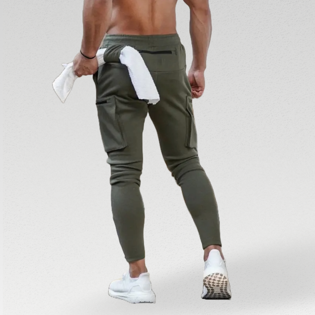 Slim Fit Men's Cargo Sweatpants - Versatile and stylish joggers for workouts or daily wear. Made from a durable cotton and polyester blend, with plenty of pocket space and functional features like rear and side pockets and a side loop for added convenience.