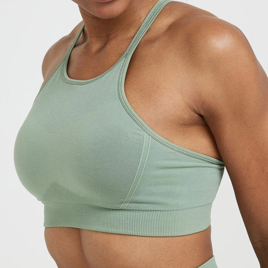 High Neck Sports Bra: Experience maximum support in athletic fashion. High-performance nylon/spandex blend for comfort, flexibility, and durability. Breathable design and quick-dry technology for a cool and confident workout. Seamless comfort with a friction-minimizing design for high-intensity workouts.