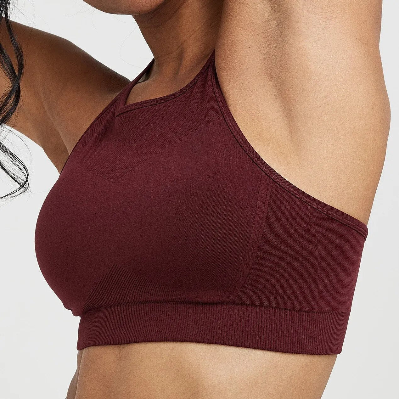 High Neck Sports Bra: Experience maximum support in athletic fashion. High-performance nylon/spandex blend for comfort, flexibility, and durability. Breathable design and quick-dry technology for a cool and confident workout. Seamless comfort with a friction-minimizing design for high-intensity workouts.