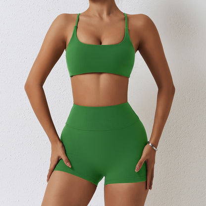 Cali Set - Elevate your workout with high-waisted shorts and cross back sports bra. Quick-dry, breathable, and stylish for a comfortable and fashionable gym session.